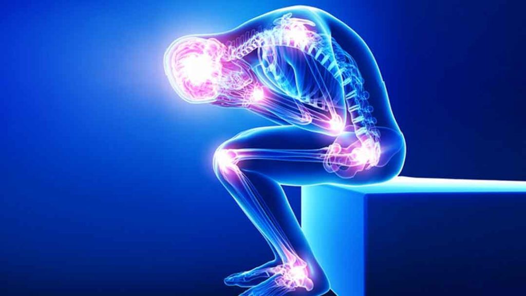 Transparent human hunched over with joints glowing to show areas of pain.