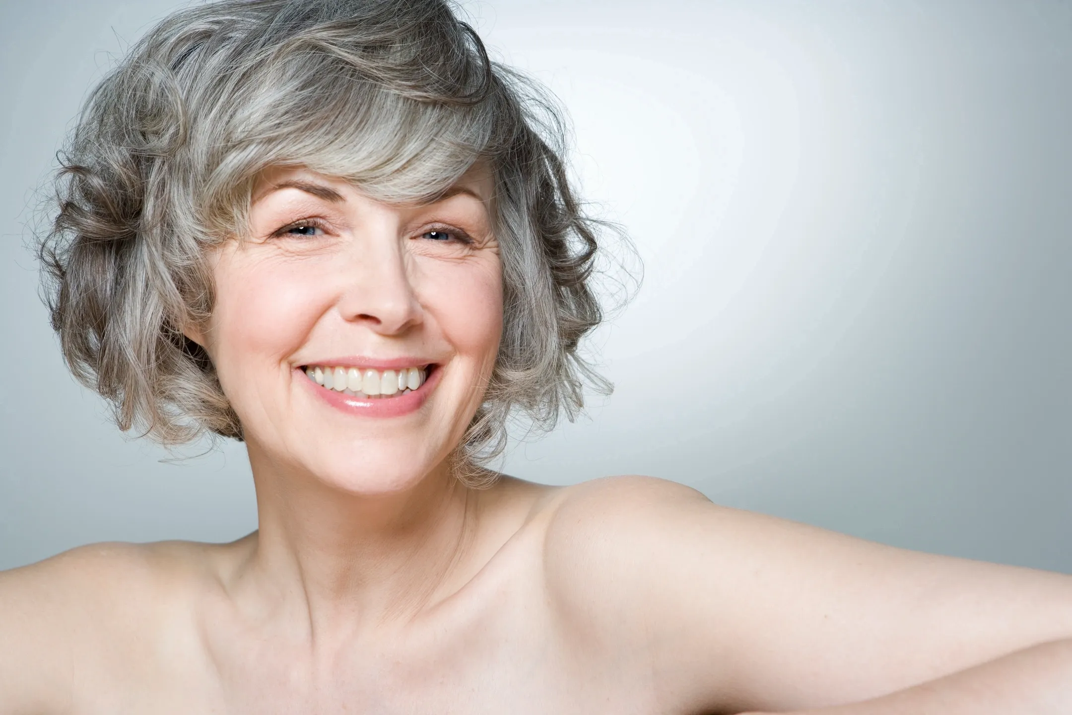 Happy older woman looking youthful