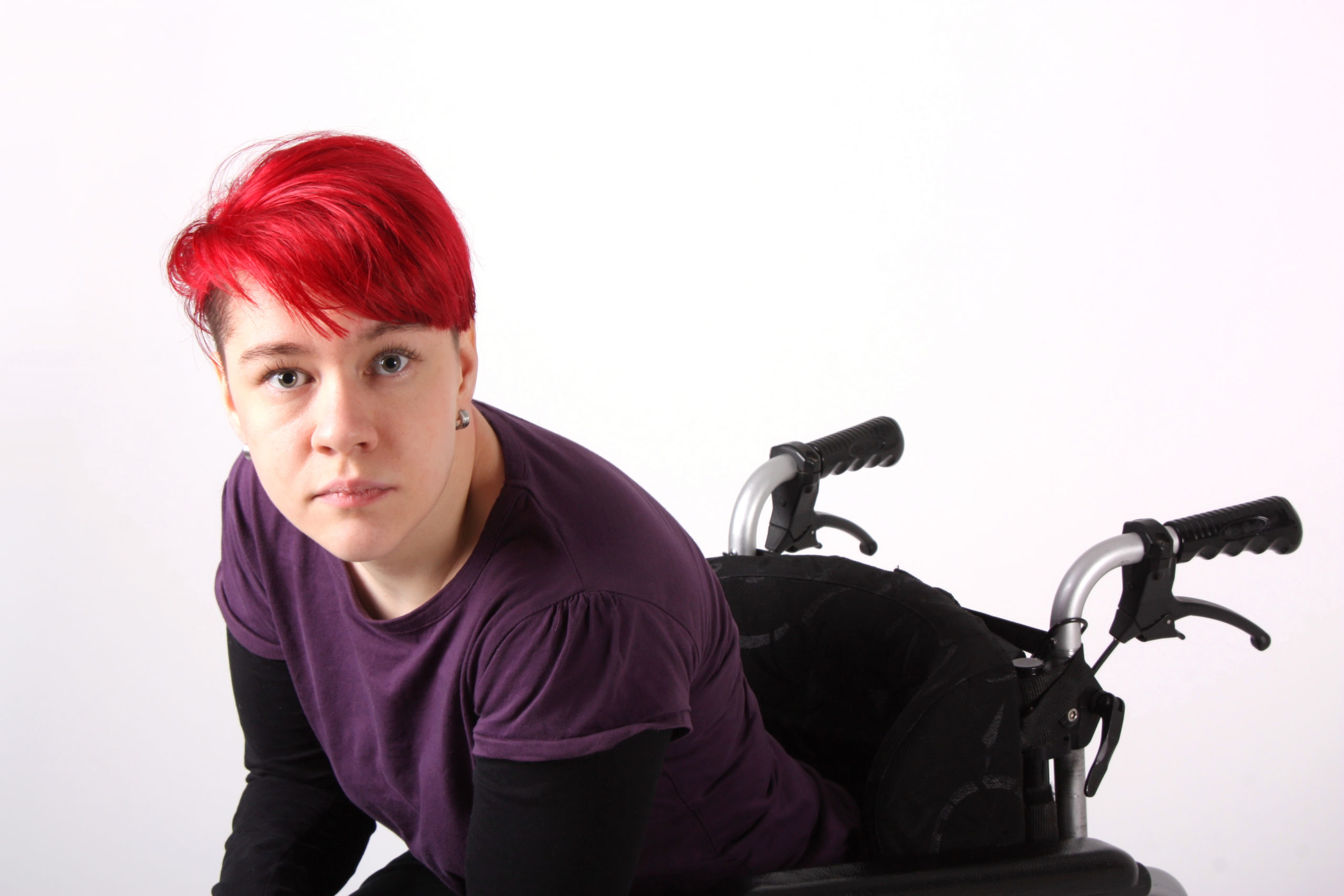 Person with Multiple Sclerosis sitting in wheelchair.