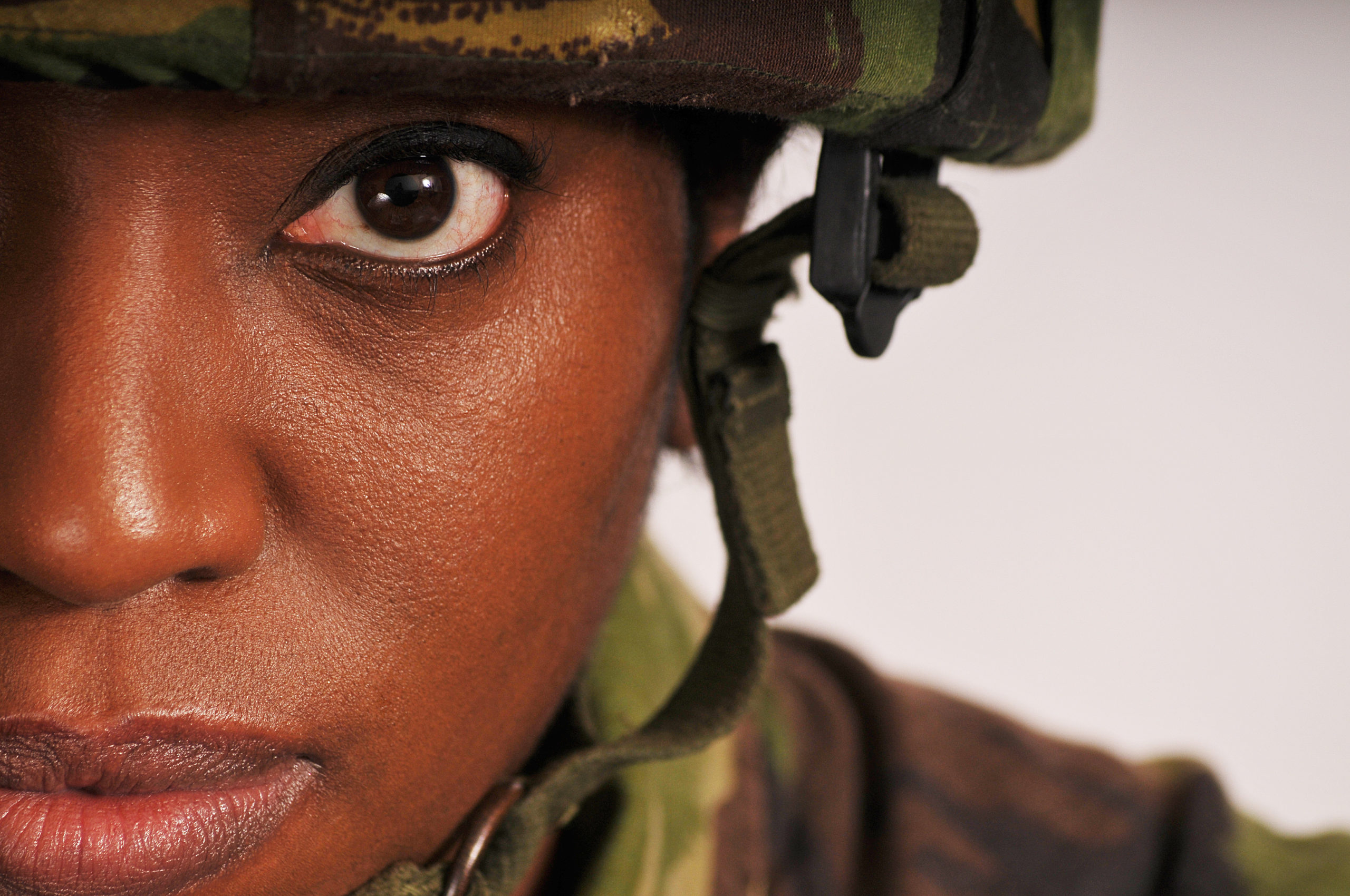 Soldier looking into the camera with solemn expression